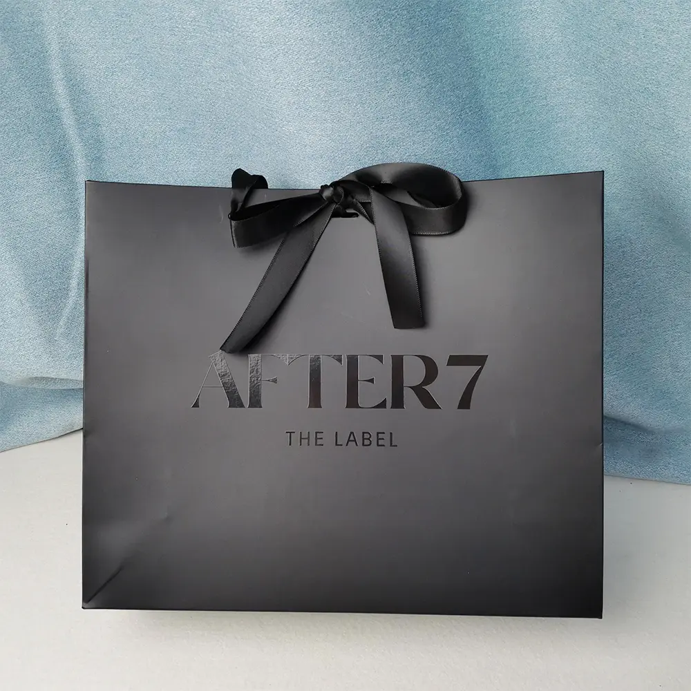 Luxury black paper bag with ribbon handle