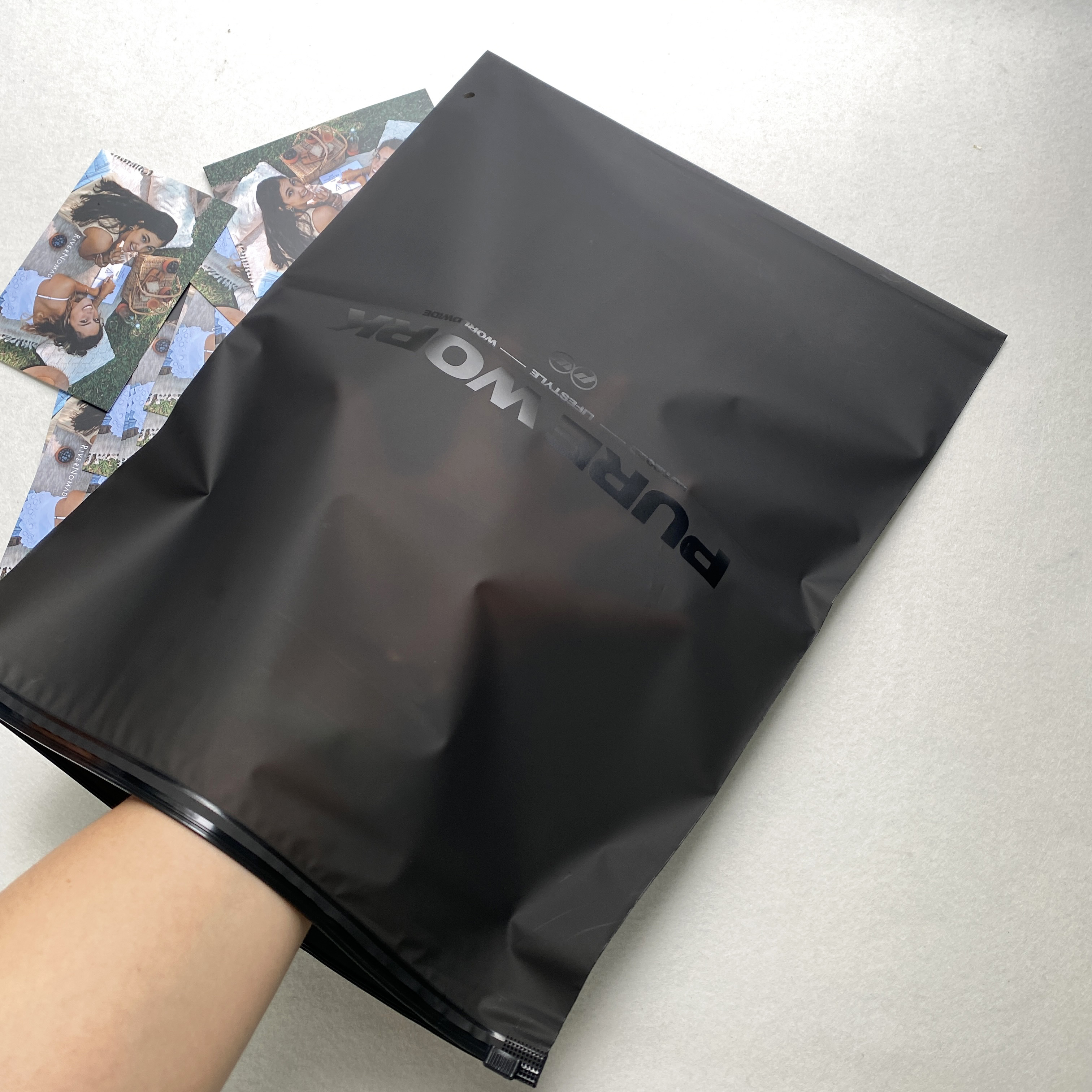 Luxury black uv logo custom garment zipper bag for business