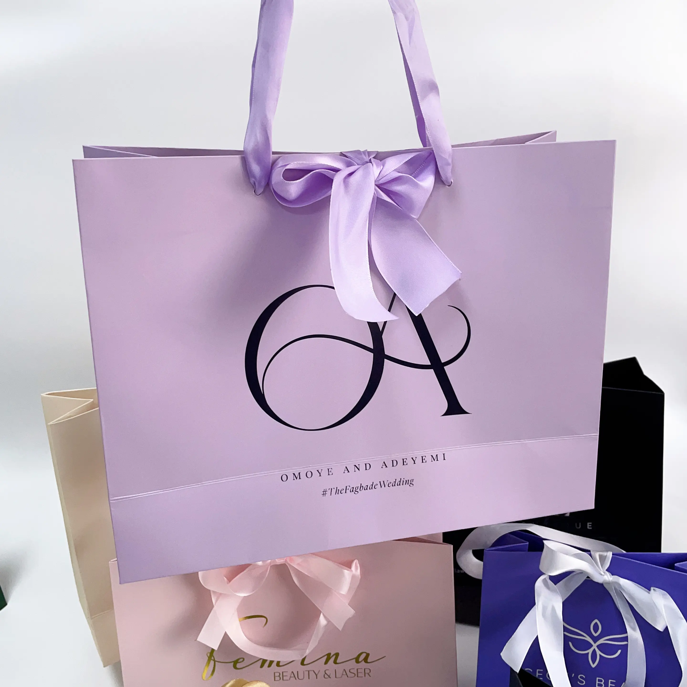 Custom Logo Beige Paper Shopping Bag With Ribbon Handle