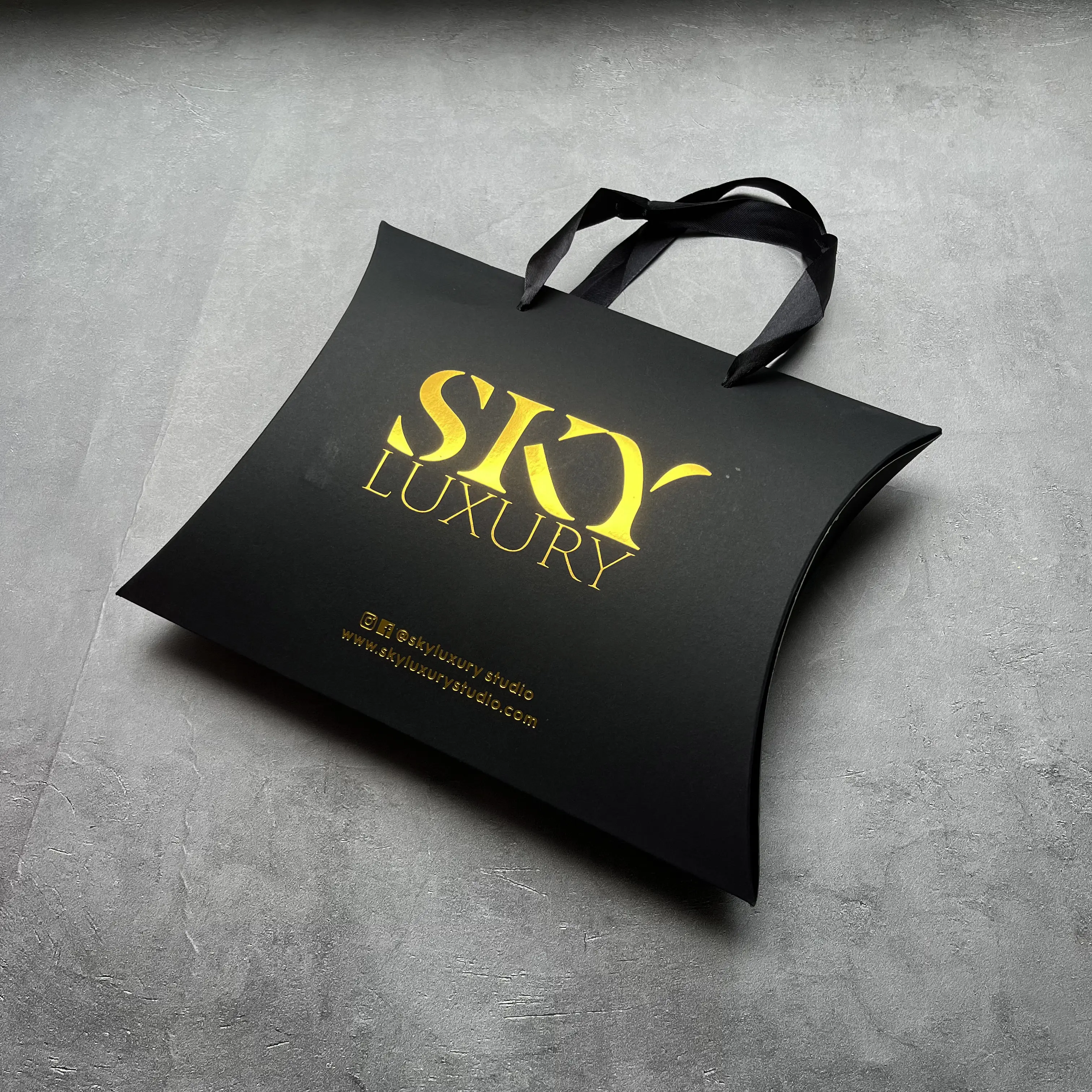 Luxury folding black paper bag with custom logo