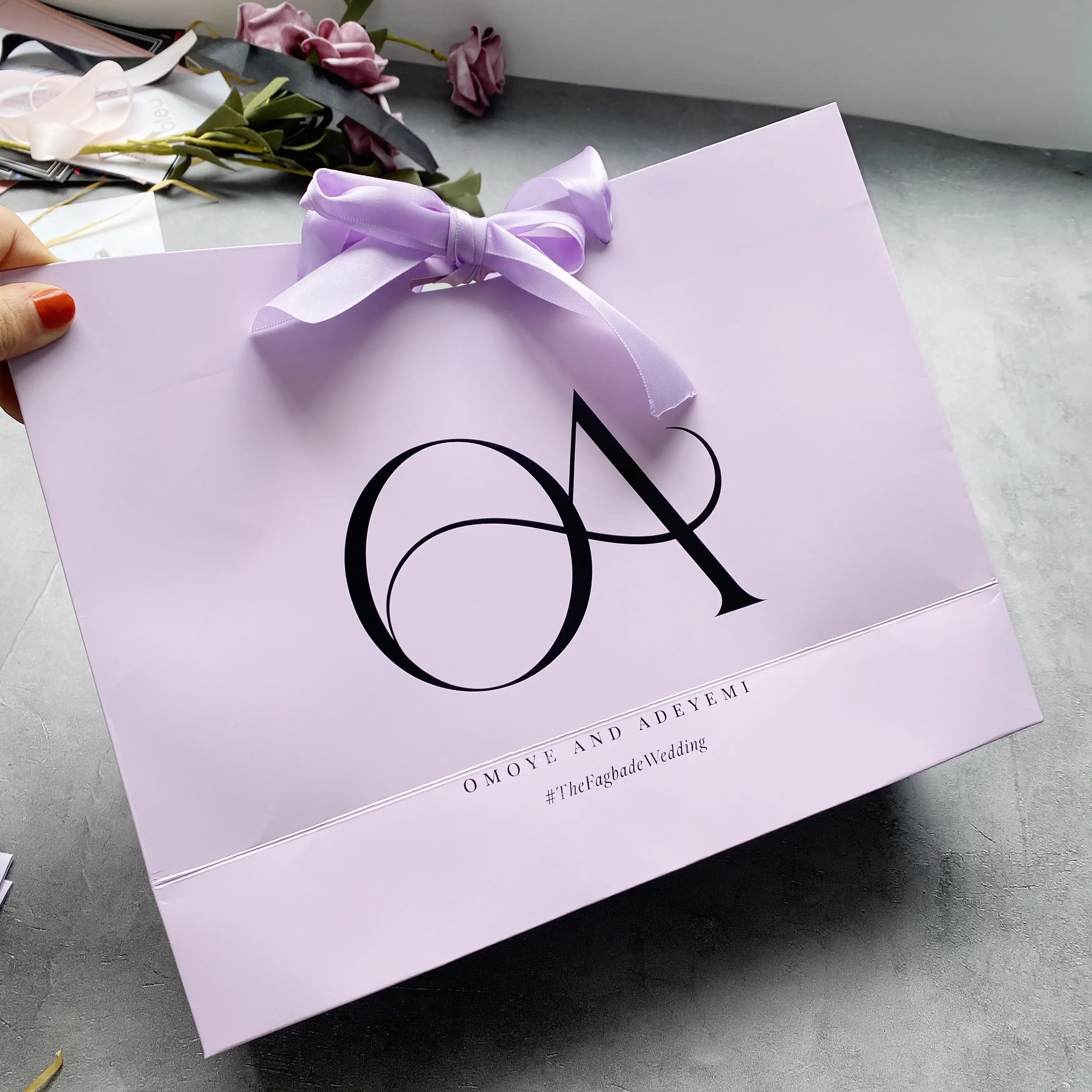 Purple paper shopping bag with custom logo printed