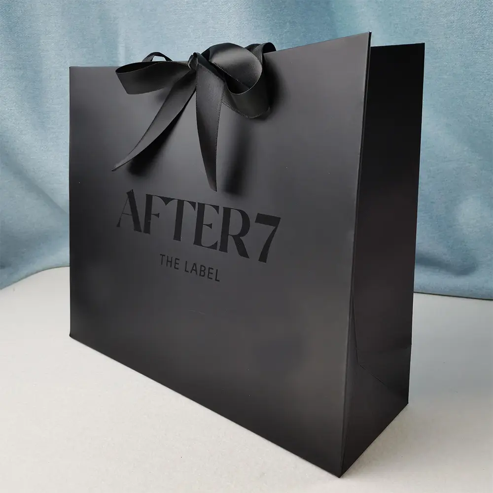 Luxury black paper bag with ribbon handle