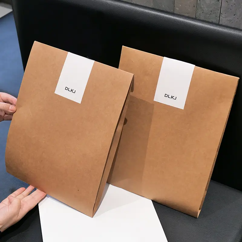 Custom logo brown kraft paper envelopes with self adhesive tape Featured Image