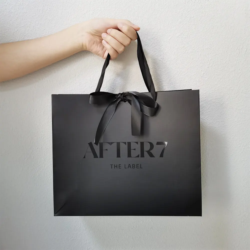 Luxury black paper bag with ribbon handle